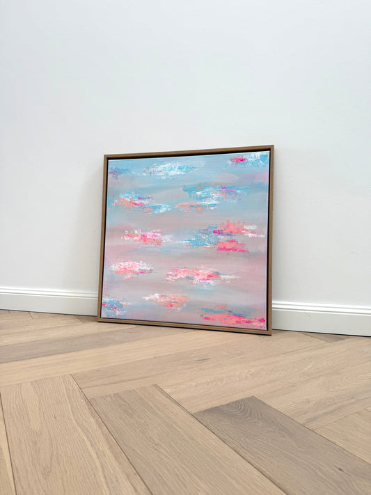 Abstraktes Acrylbild PASTEL HORIZONS 60x60 cm in Pastell Blau und Rosa, gerahmt, an weißer Wand auf hellem Holzboden angelehnt