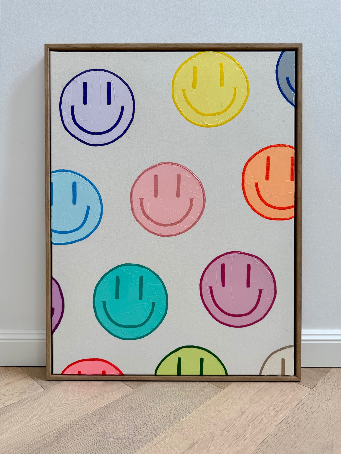 Frontansicht von HAPPY #19 mit pastellfarbenen Happy-Faces, strukturierter Acrylmalerei und hochwertigem Schattenfugenrahmen.